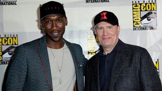 Mahershala Ali and Kevin Feige pose for photographs at Comic-Con 2019
