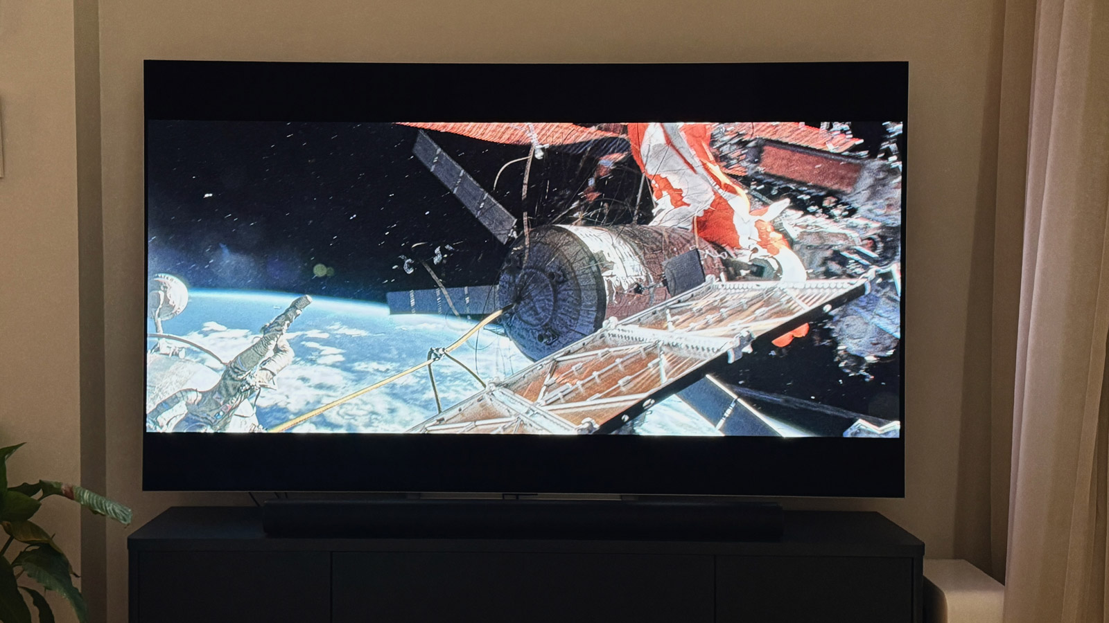 A scene from the movie Gravity displayed on a TV