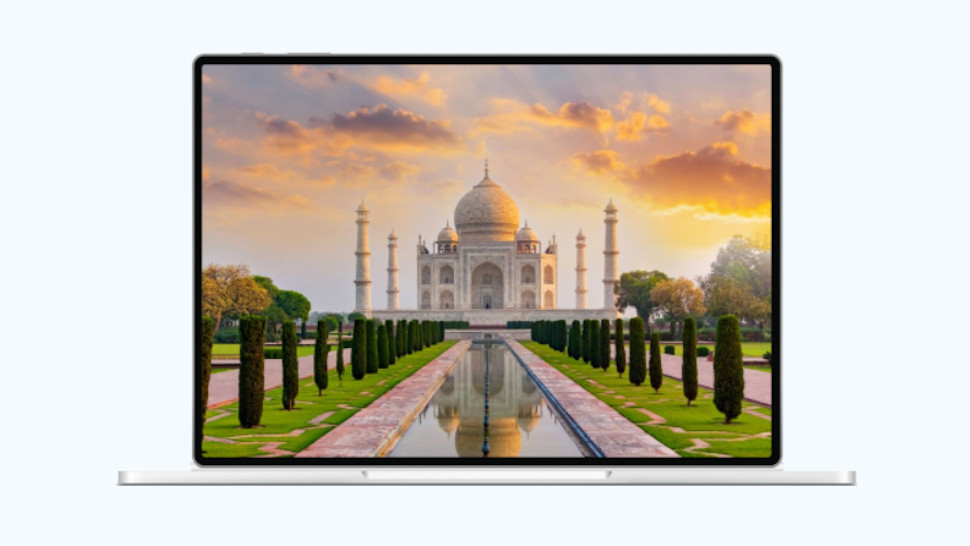 Windows 11 Bing Wallpaper app shown running on a laptop