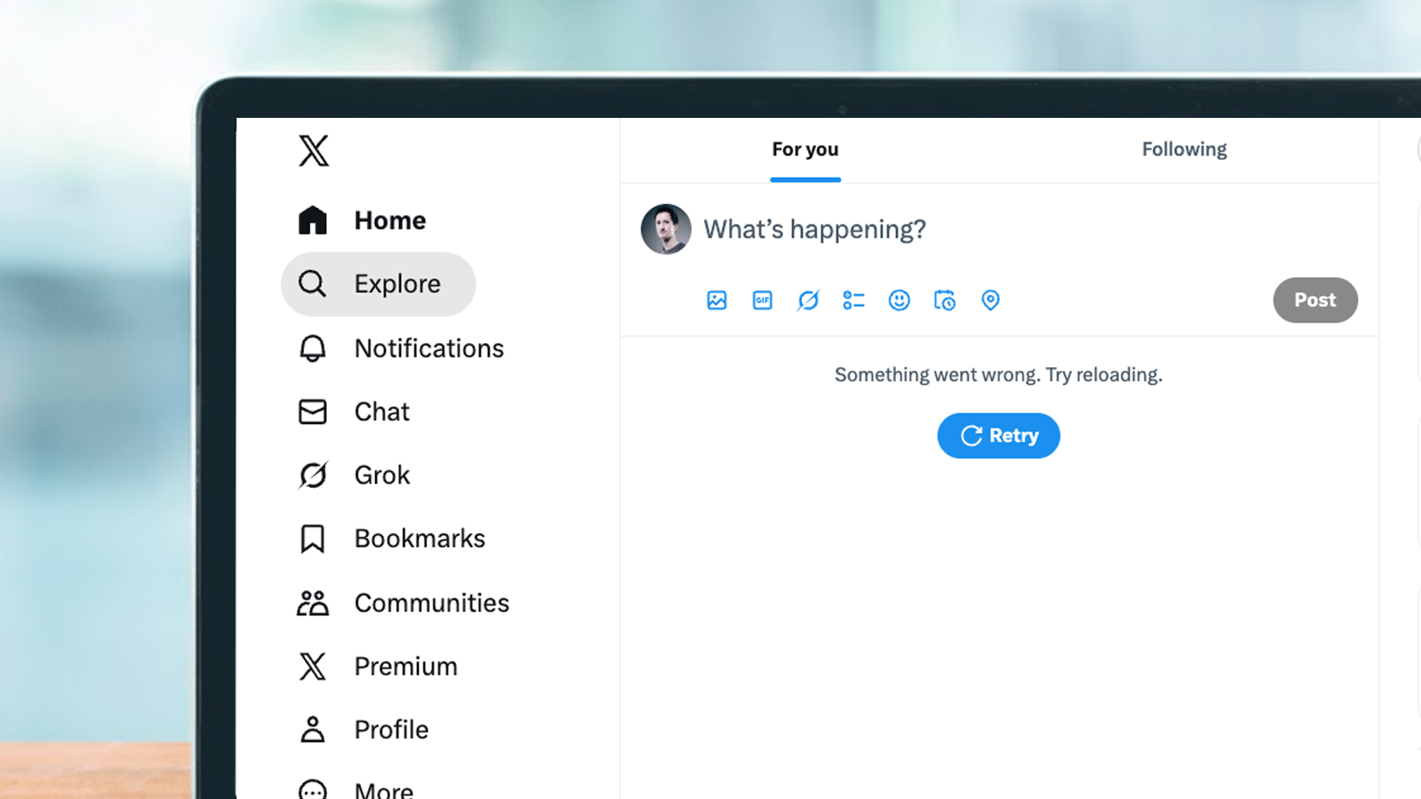 A laptop screen showing an error message on X