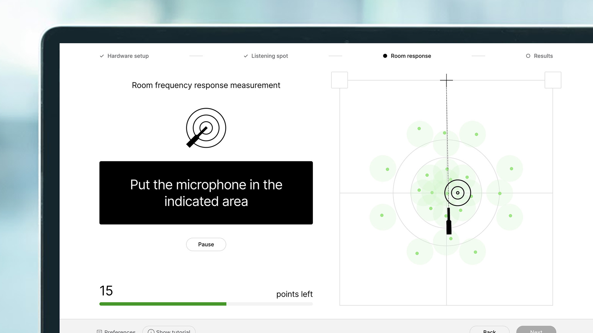 A laptop screen showing software from the Audient Ora Mini roomEQ device