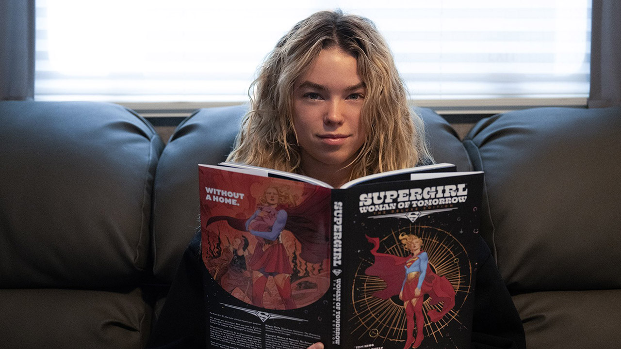 Milly Alcock reading the Supergirl: Woman of Tomorrow comic book