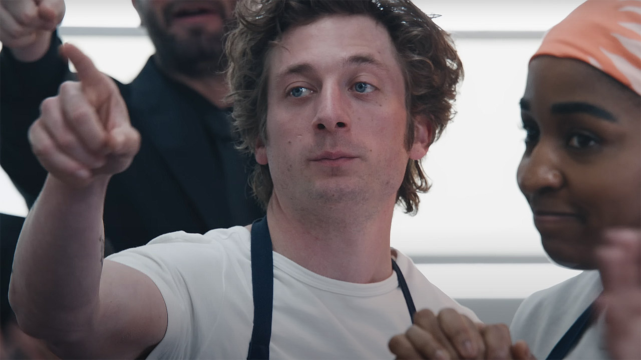 Carmy pointing at someone off-camera in The Bear season 4