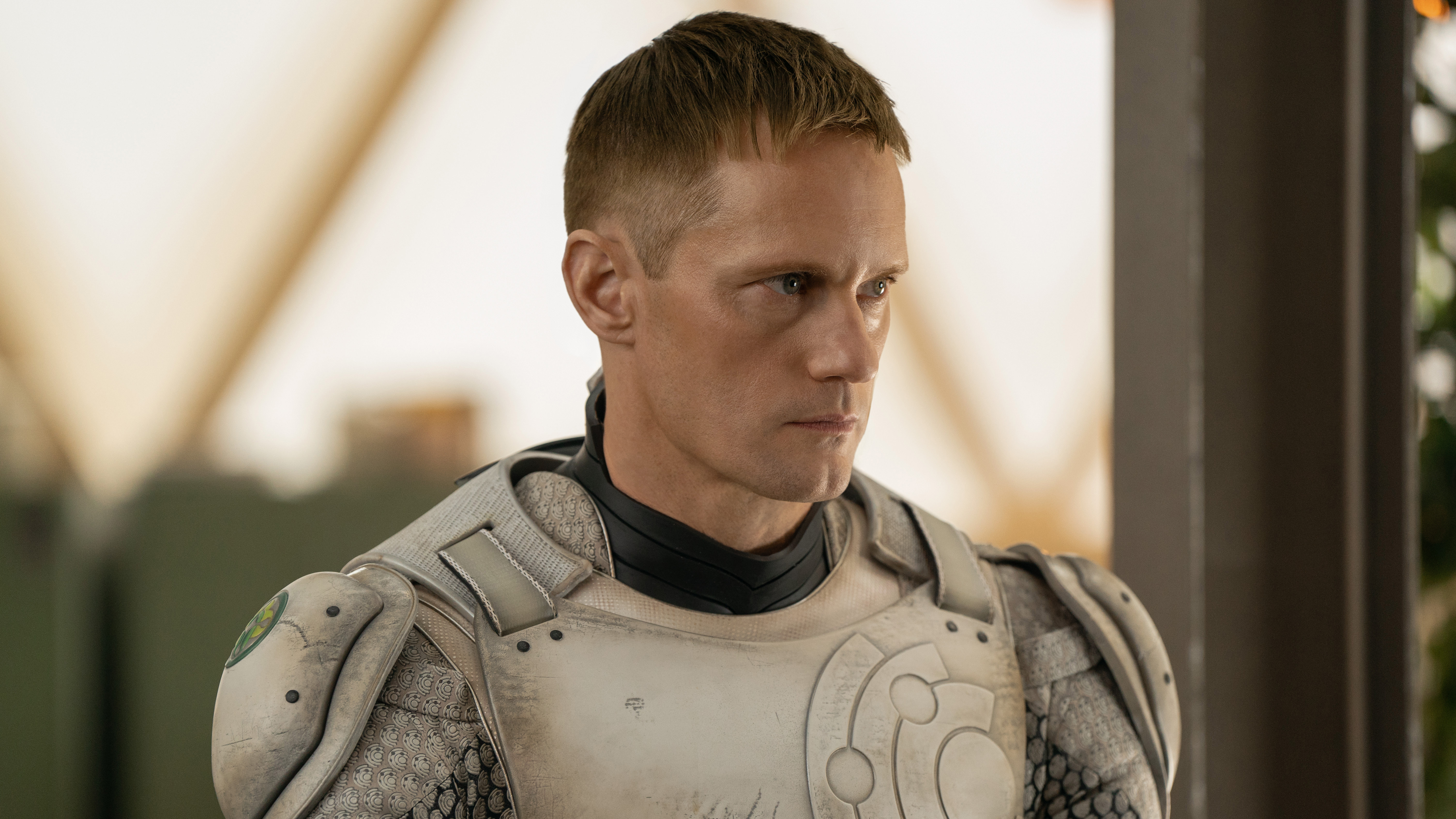 Alexander Skarsg&amp;aring;rd wears a robot suit in Murderbot series