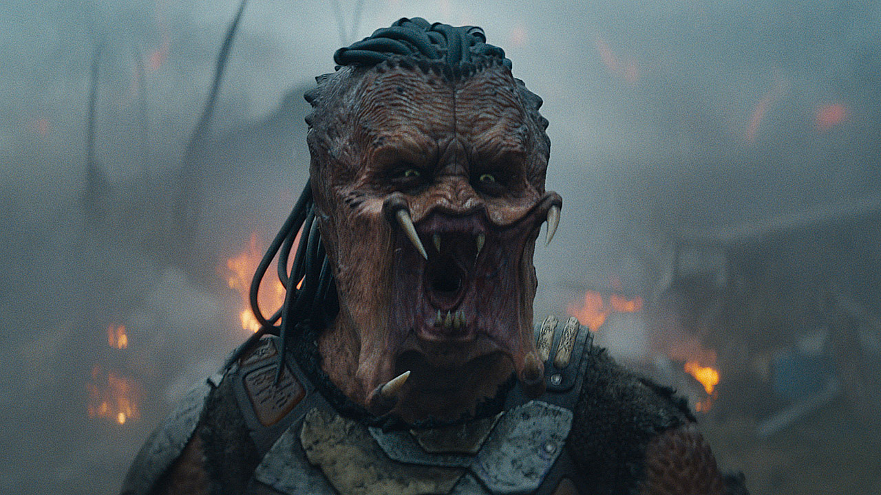 A Yautja screaming at something off-camera in Predator: Badlands