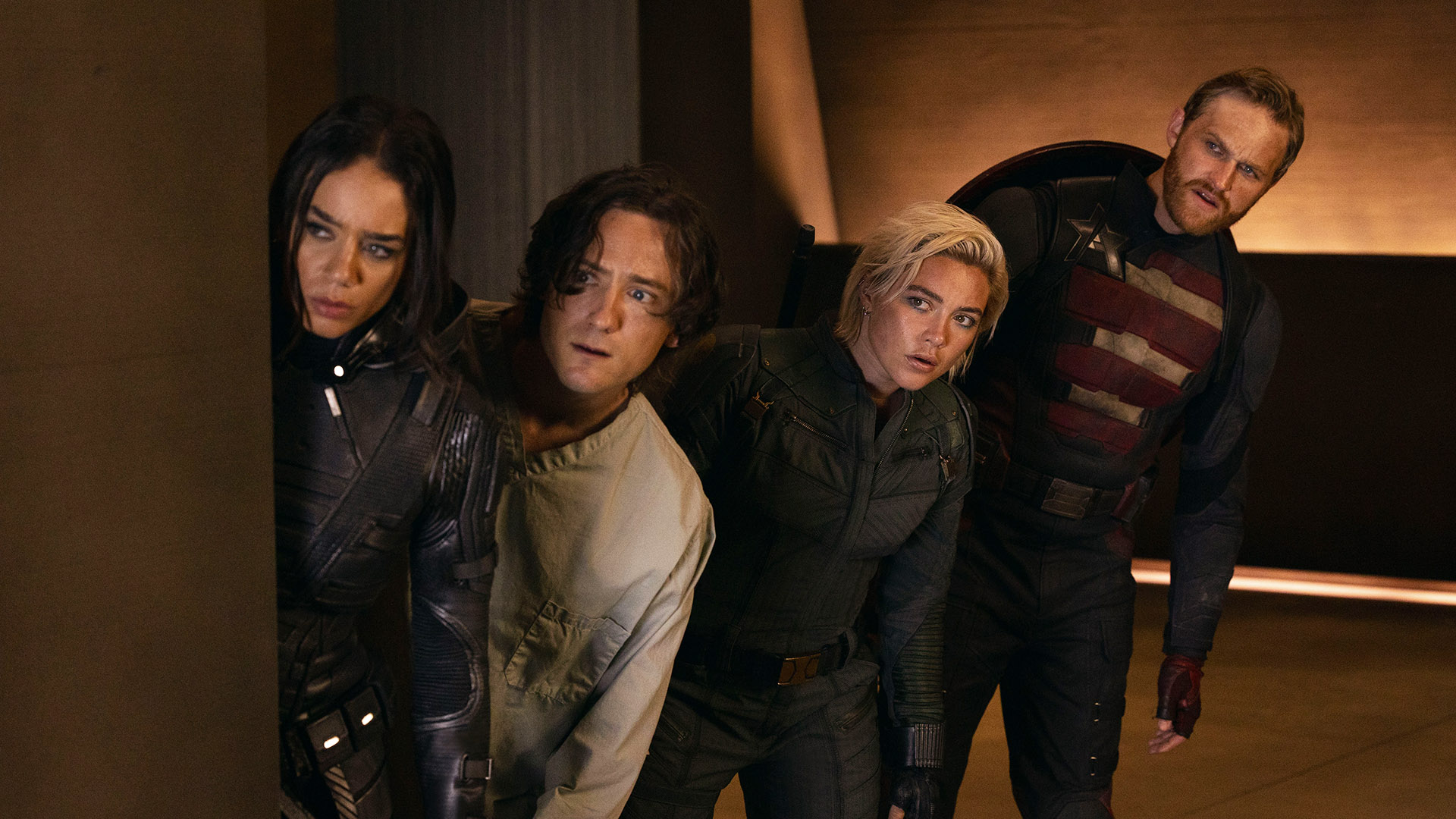 Ghost, Bob, Yelena, and US Agent peeking around a wall in Marvel's Thunderbolts* film