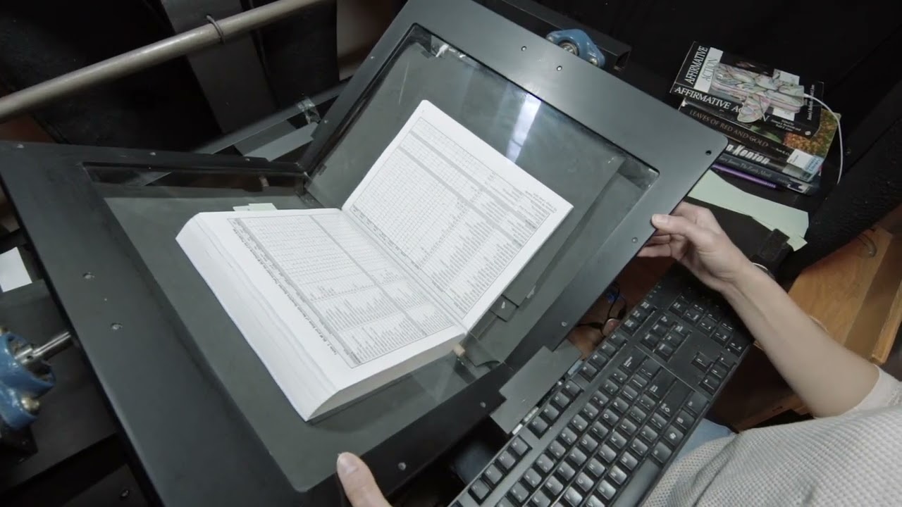 Eliza digitizing books at the Internet Archive - YouTube