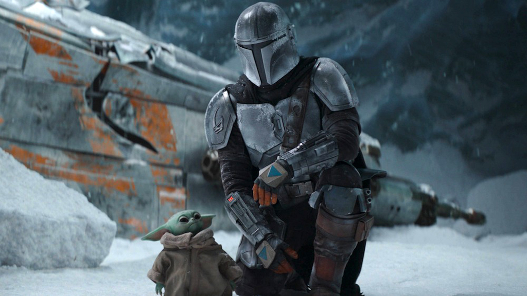 Din Djarin and Grogu in a snowy setting in The Mandalorian season 2