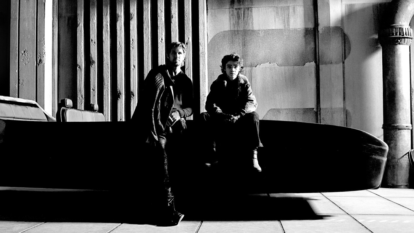 Ryan Gosling and Flynn Gray on the set of Star Wars Starfighter, sitting on a vehicle