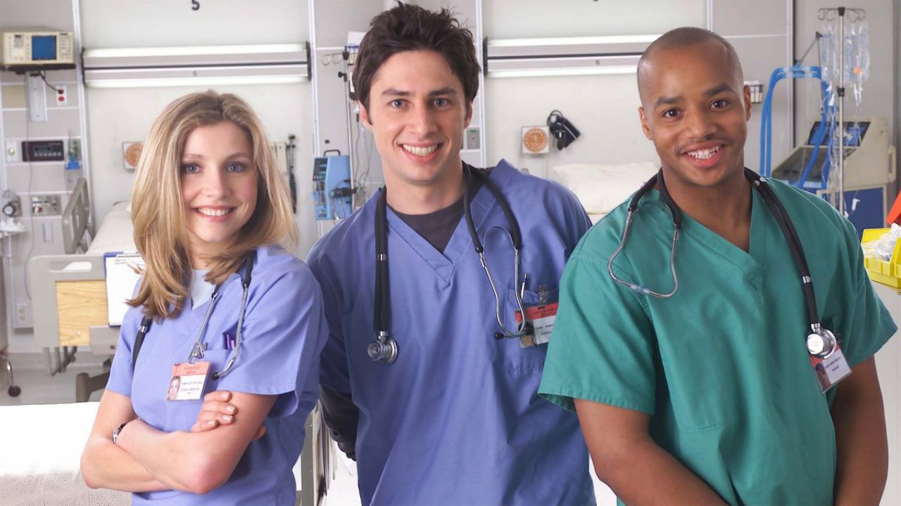Elliot, J.D, and Turk smiling in a hospital in the original Scrubs TV show