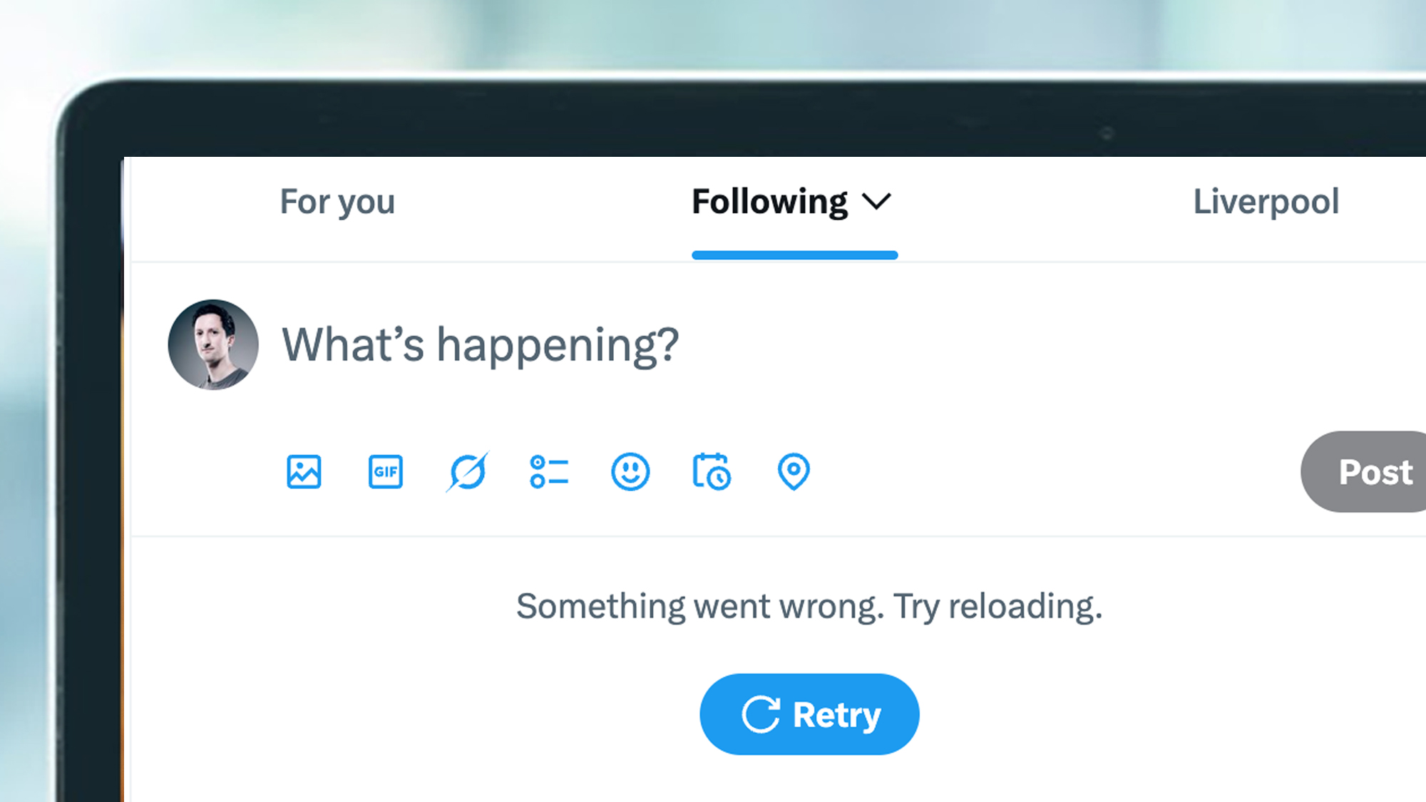 A laptop screen showing an error message on X