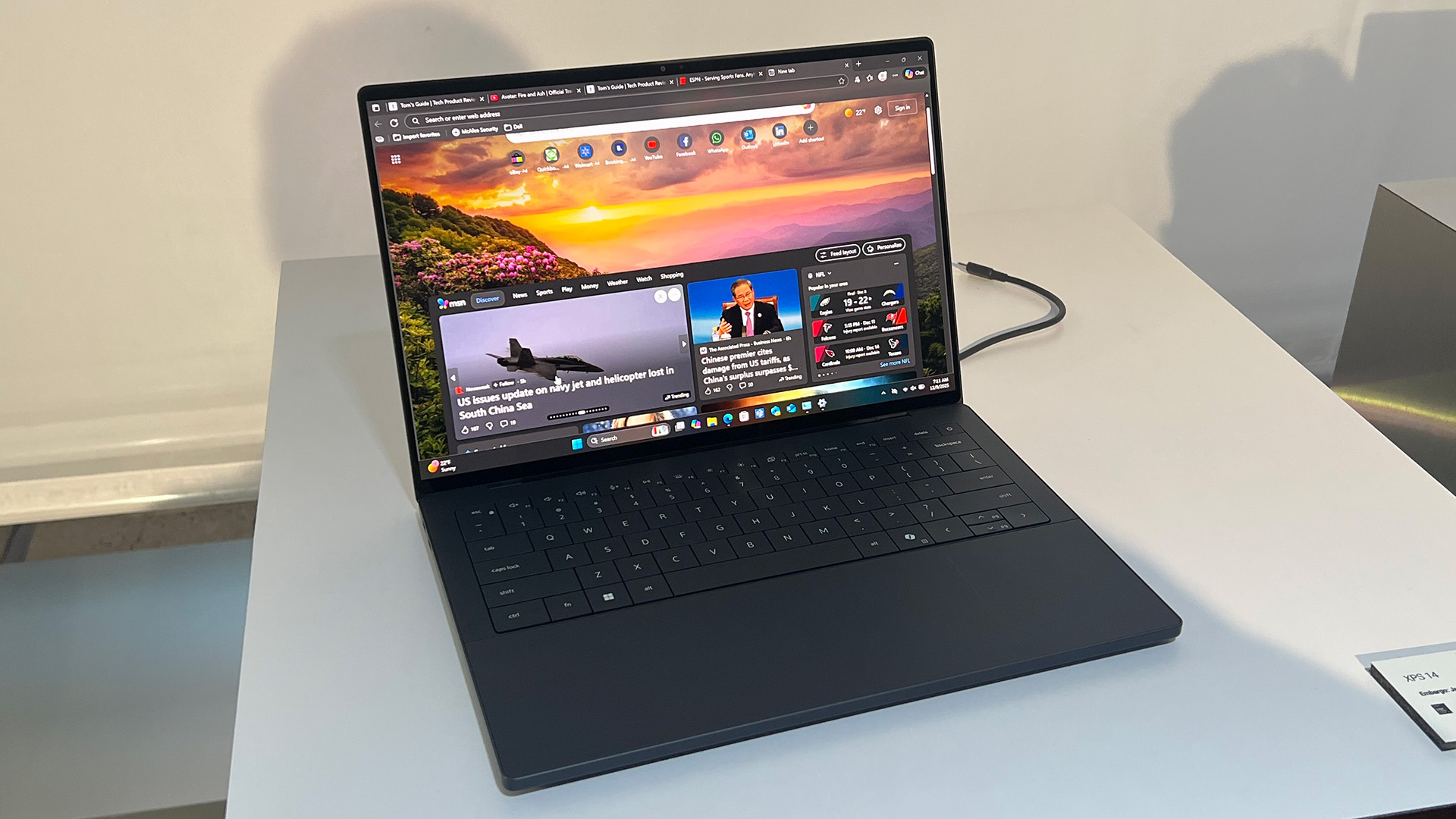 A Dell XPS 14 sitting on display