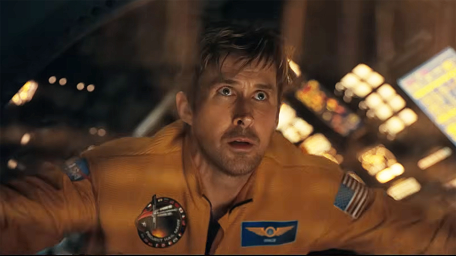Ryan Gosling's Ryland Grace staring out of a starship window and into space in Project Hail Mary