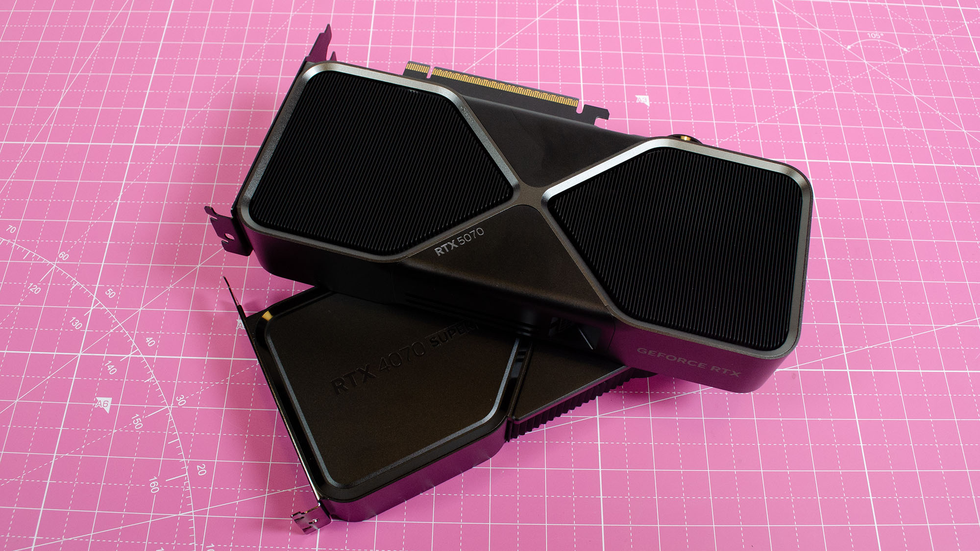 An Nvidia GeForce RTX 5070 on top of an RTX 4070 Super graphics card