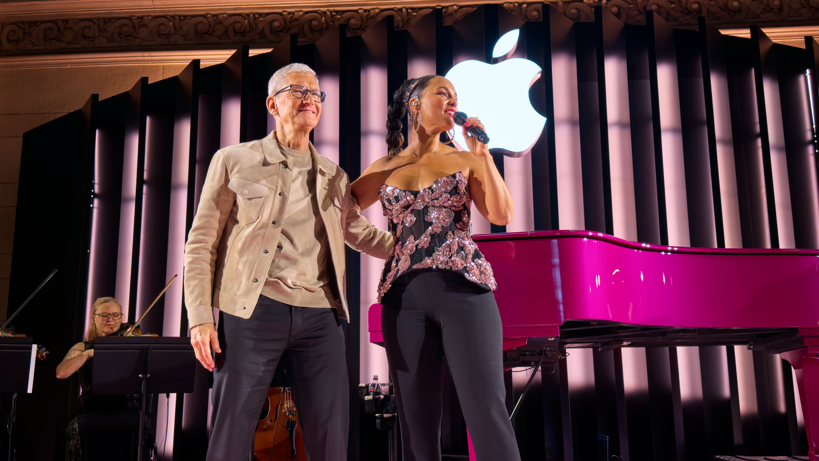 Tim Cook and Alicia Keys on stage at Apple's 50th anniversary celebrations