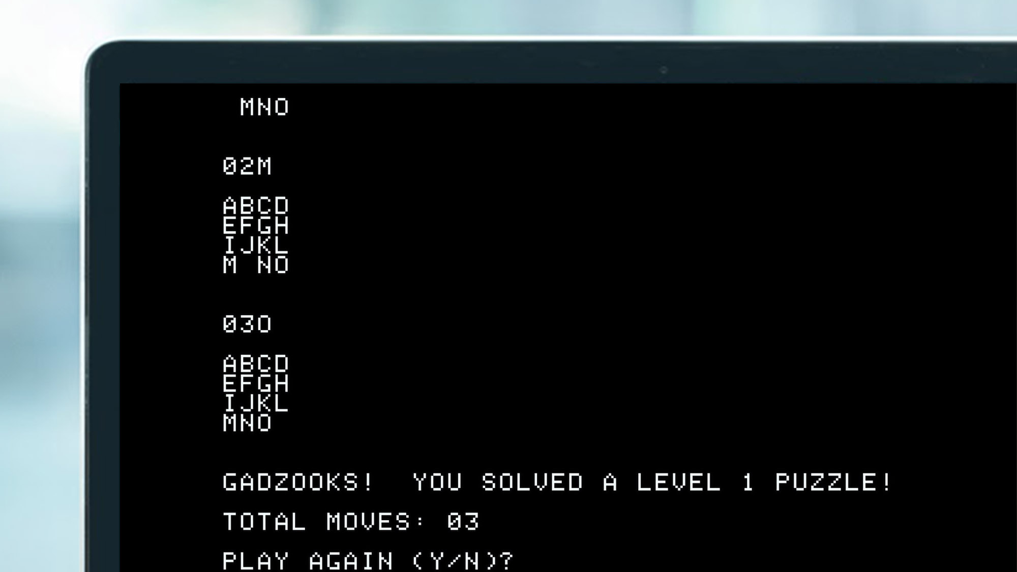 An emulated Apple-1 game on a laptop