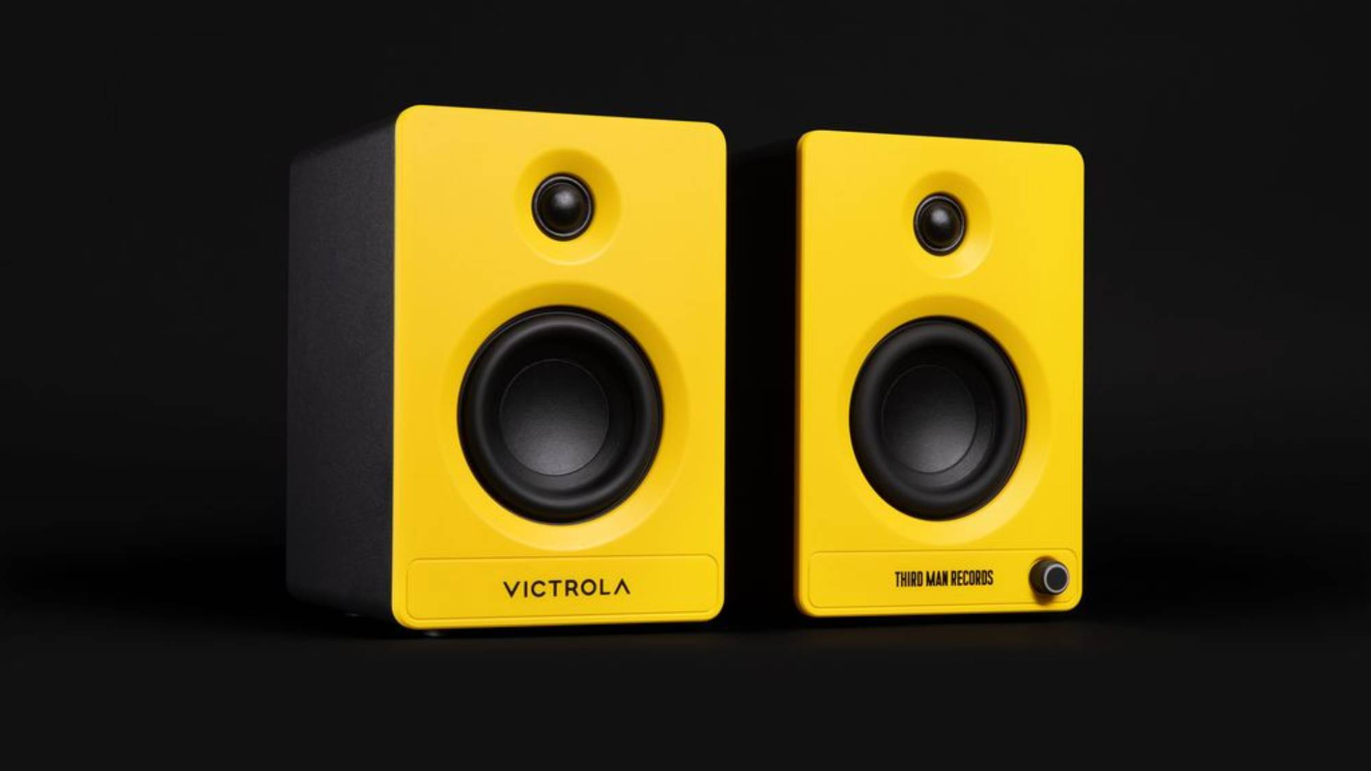 A close up of the Victrola Tempo speakers in black and yellow