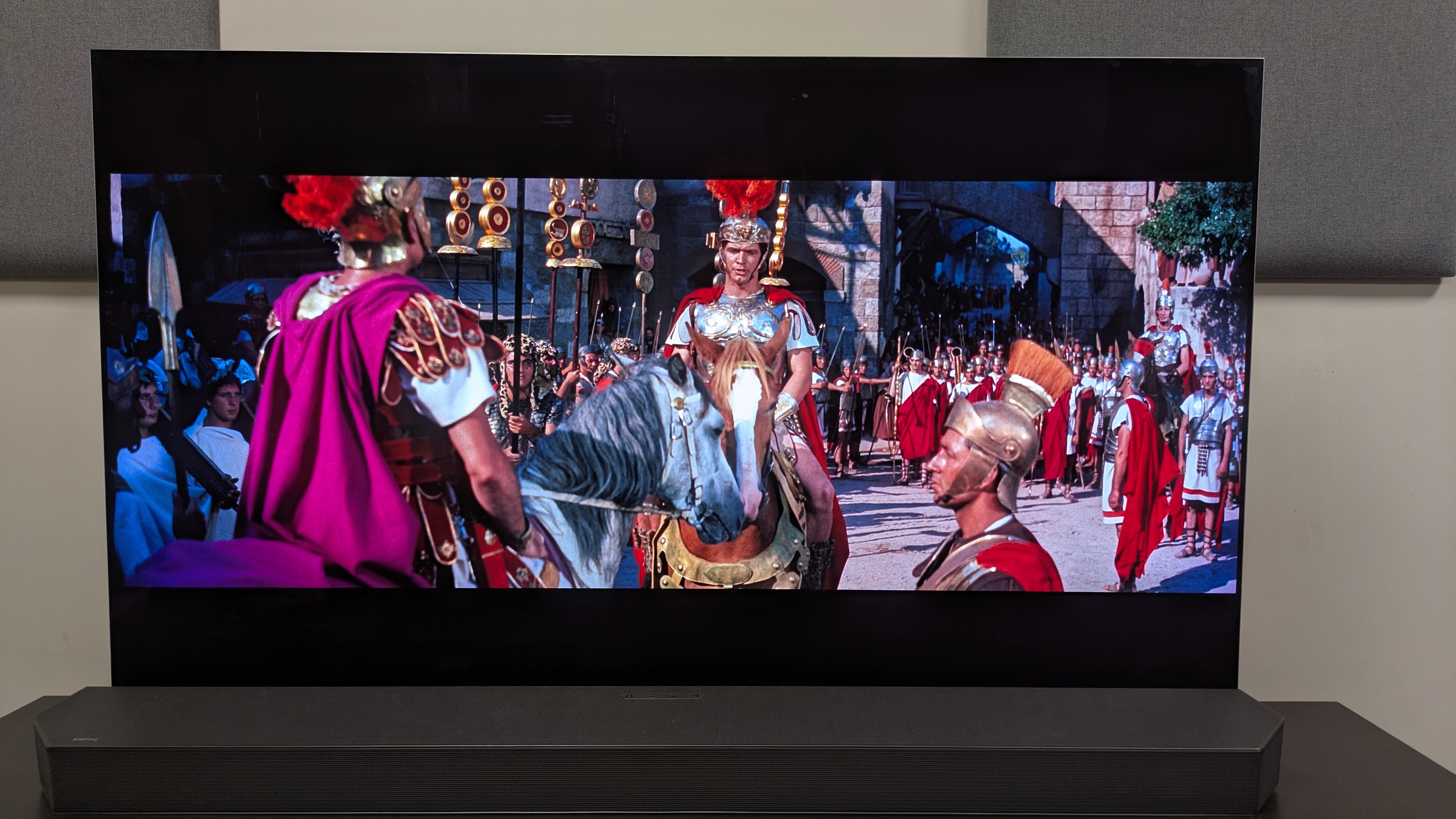 LG G5 OLED with Ben-Hur 4K Blu-ray on screen, showing roman soldiers conversing 