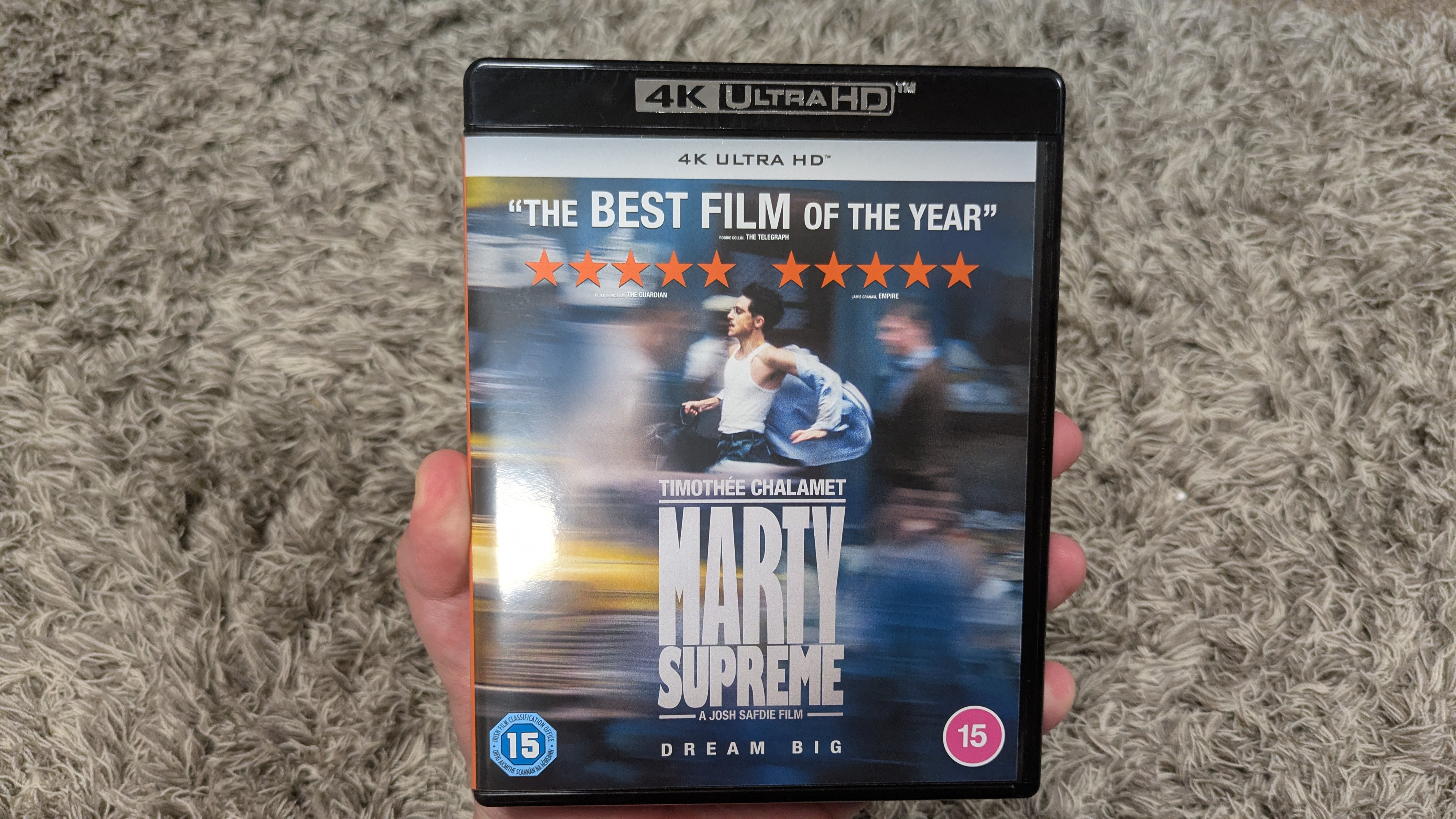 Marty Supreme 4K Blu-ray on LG G5 showing Marty and two other patrons in a pool hall 