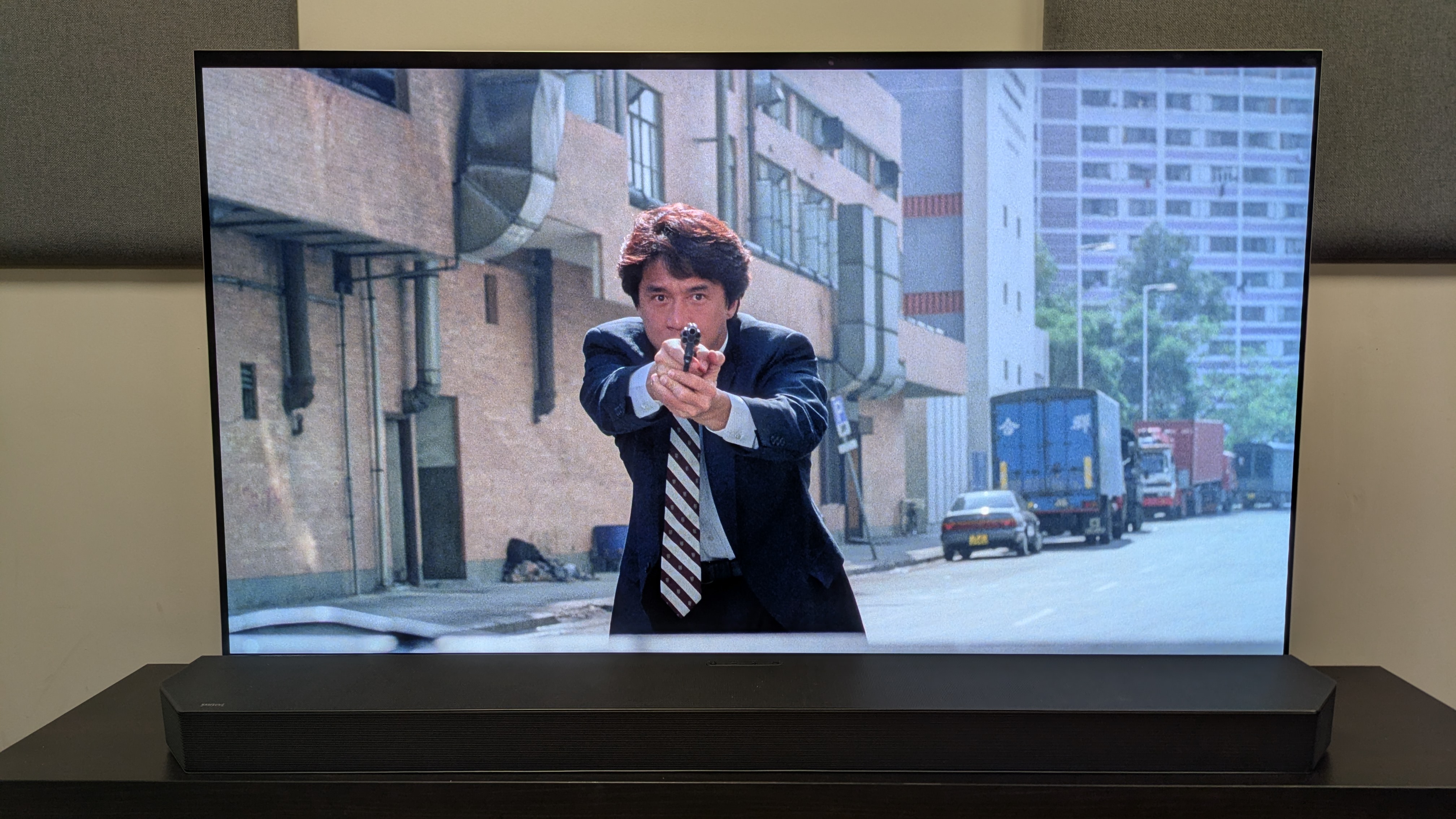 Crime Story 4K Blu-ray on LG G5 showing Inspector Chan pointing a gun towards the camera 