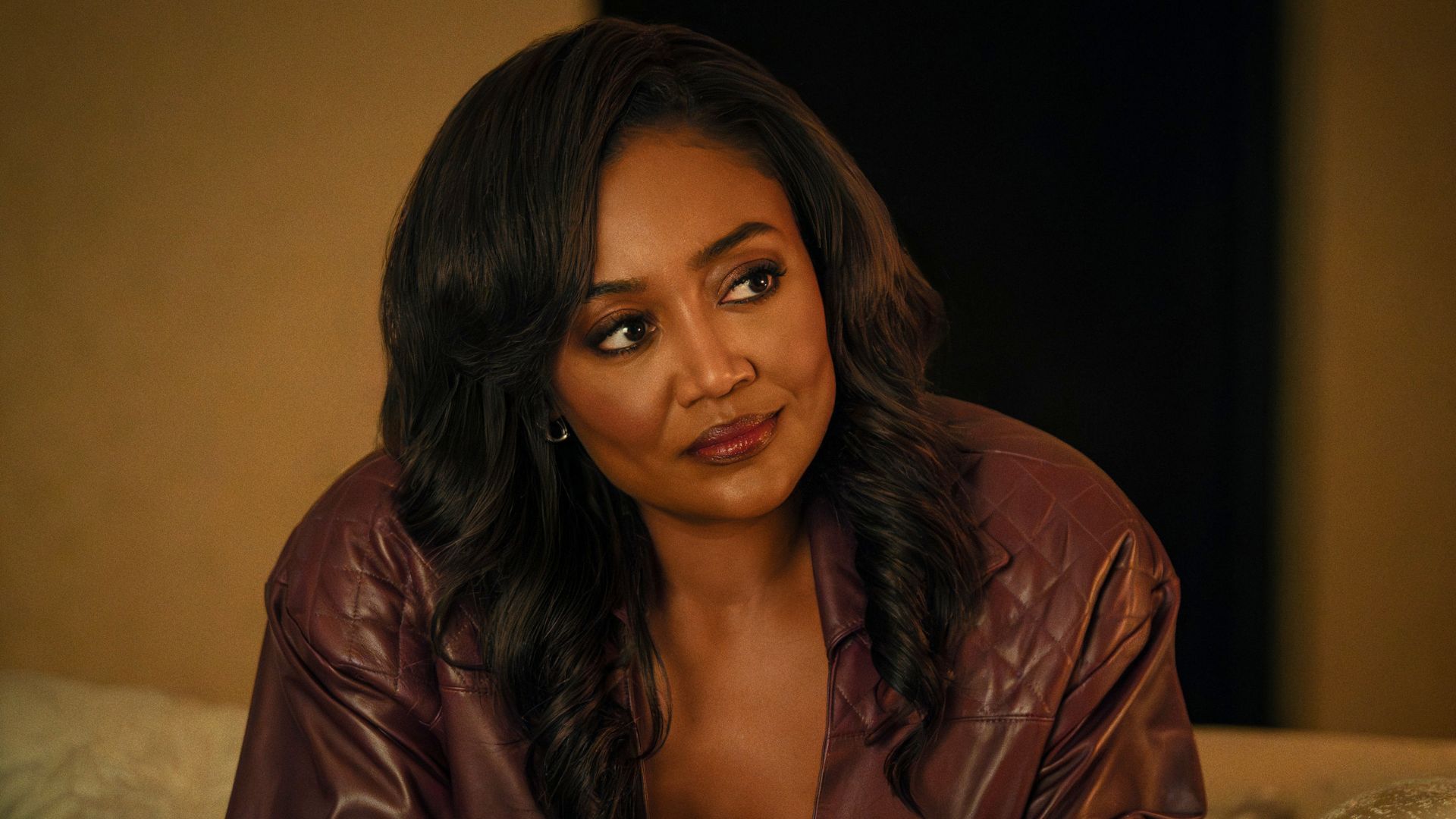 Raq looks at something offscreen