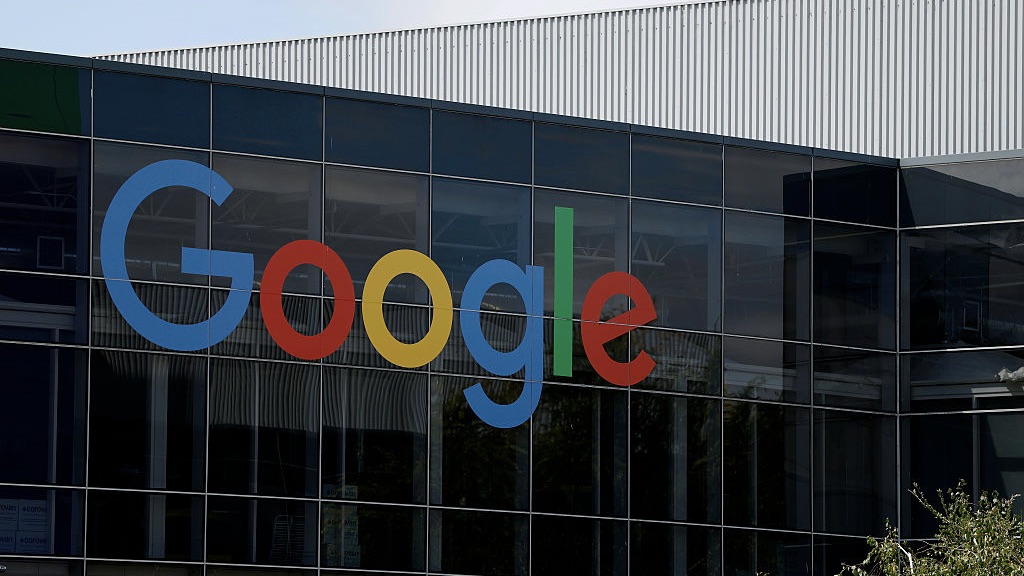 A sign is posted on the exterior of a building on the Google headquarters campus on July 23, 2025 in Mountain View, Californi