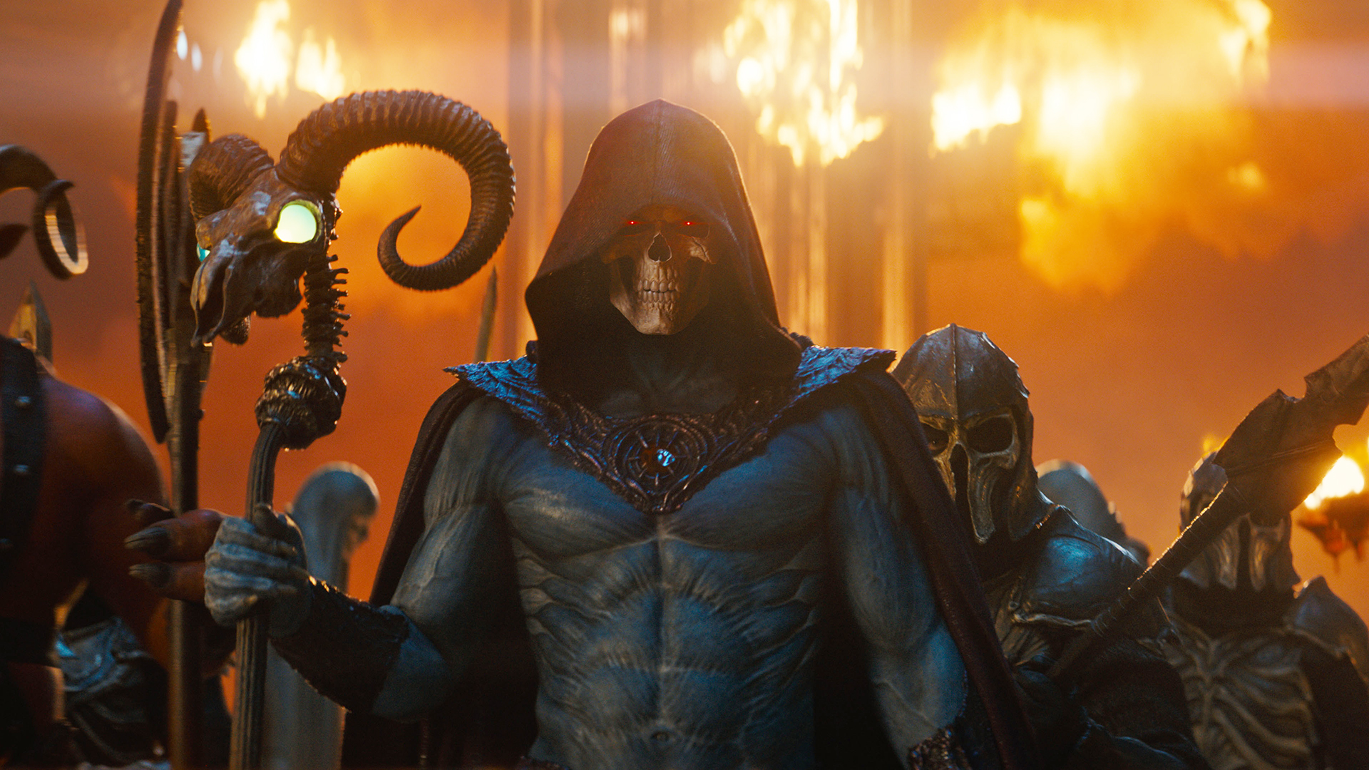 Skeletor holding his Havoc Staff as buildings burn behind him in Amazon's Masters of the Universe movie