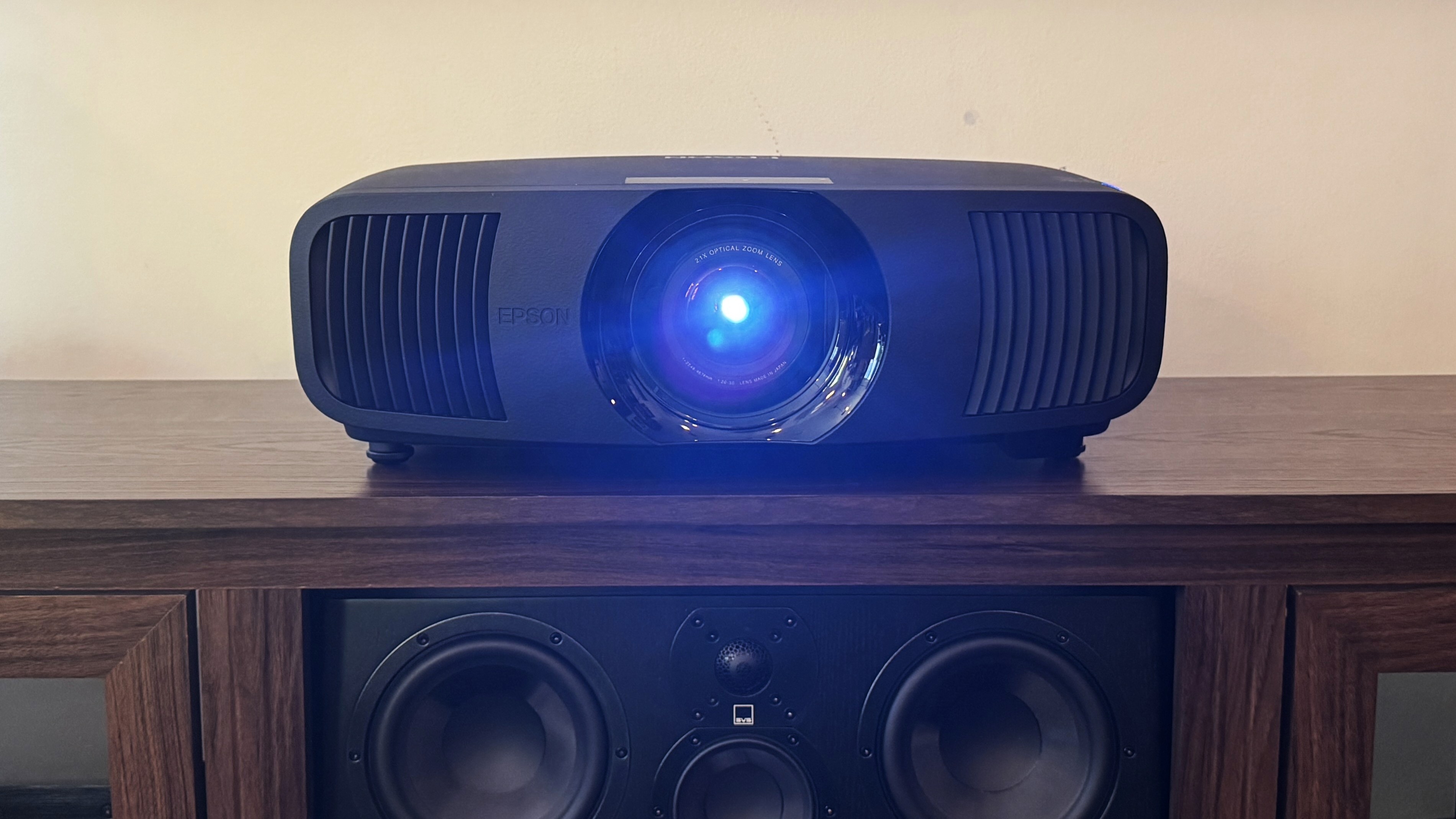 Epson Pro Cinema LS9000 on table with laser light on