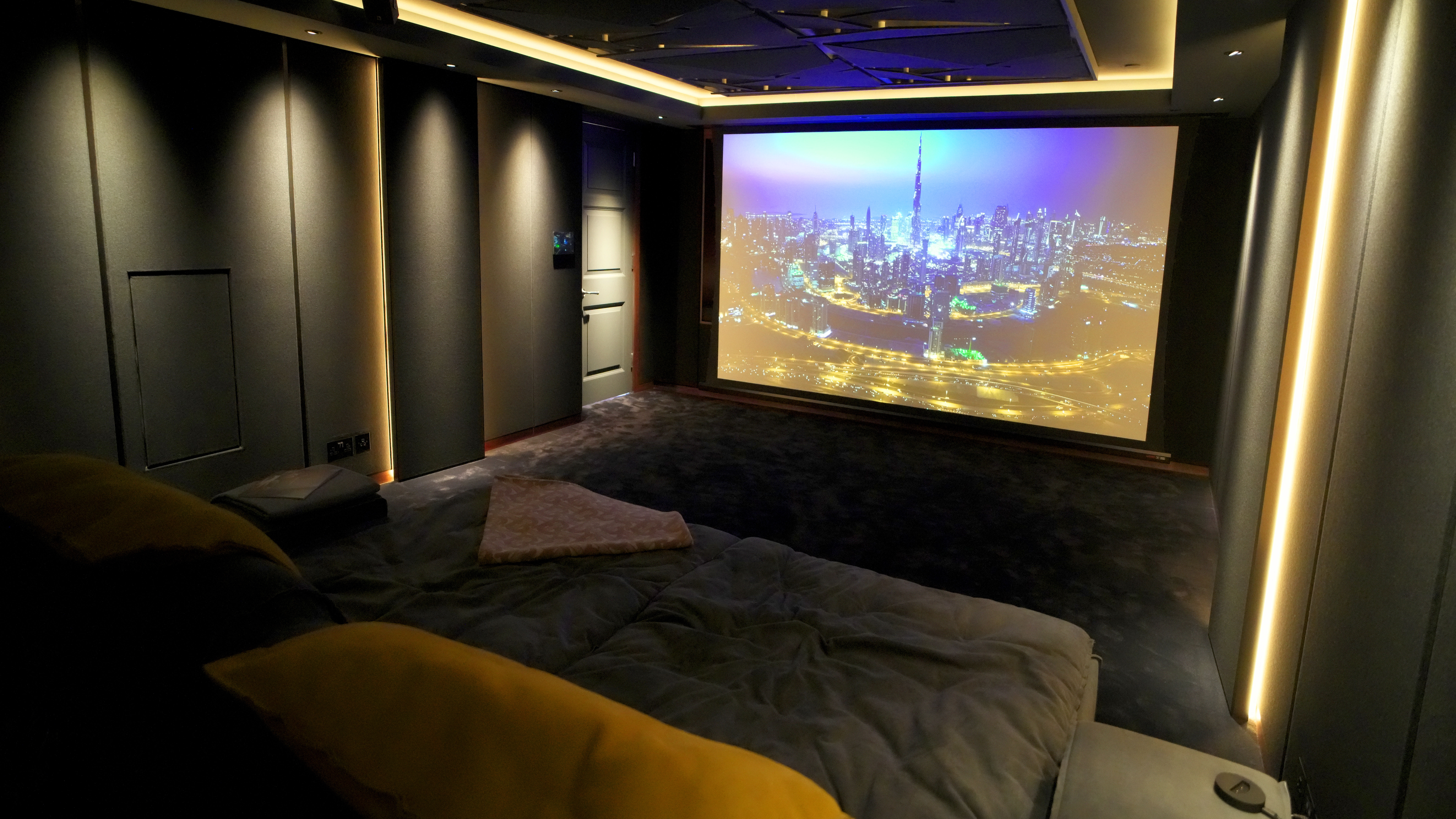 Right rear angle shot of Westminster townhouse home theater from Homeplay x L-Acoustics
