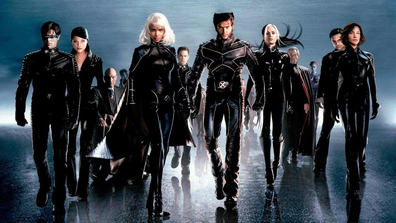 A press image showing the X-Men walking towards the screen in their 2000 movie