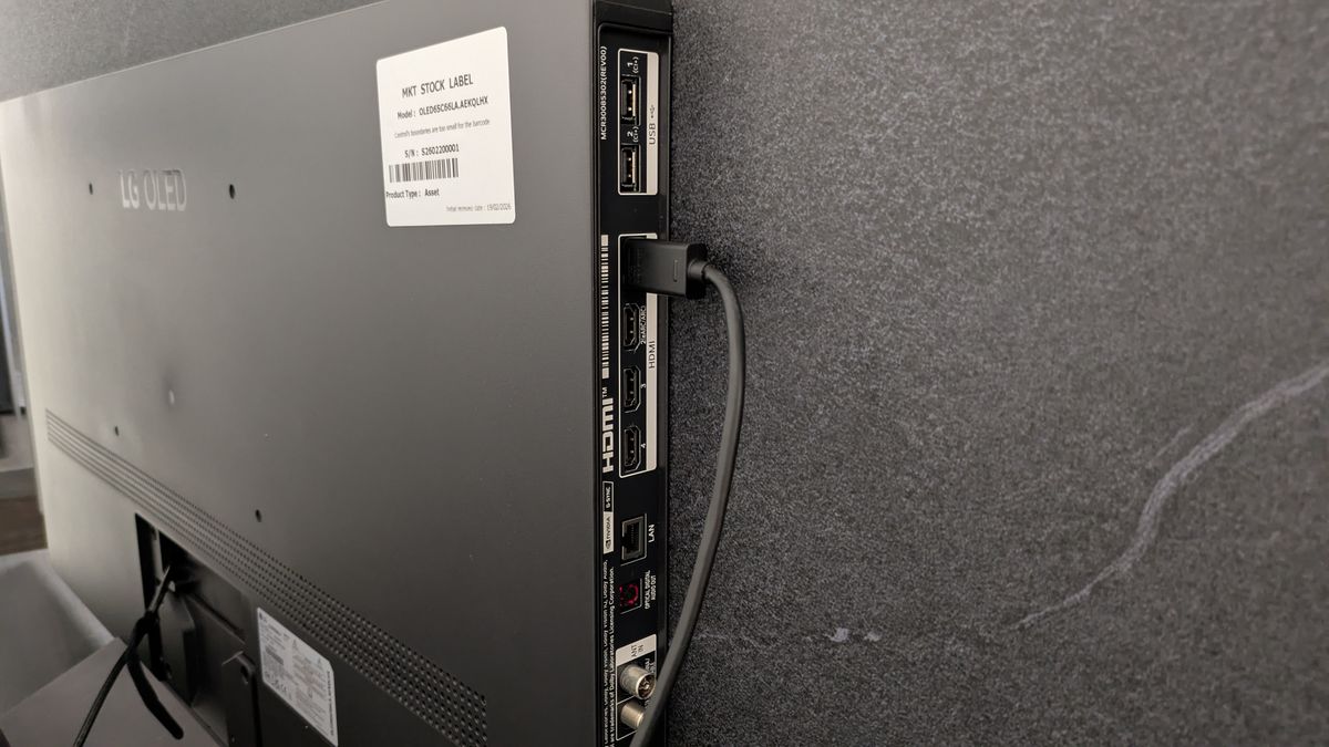 The LG C6 OLED TV ports with HDMI cable in port 1