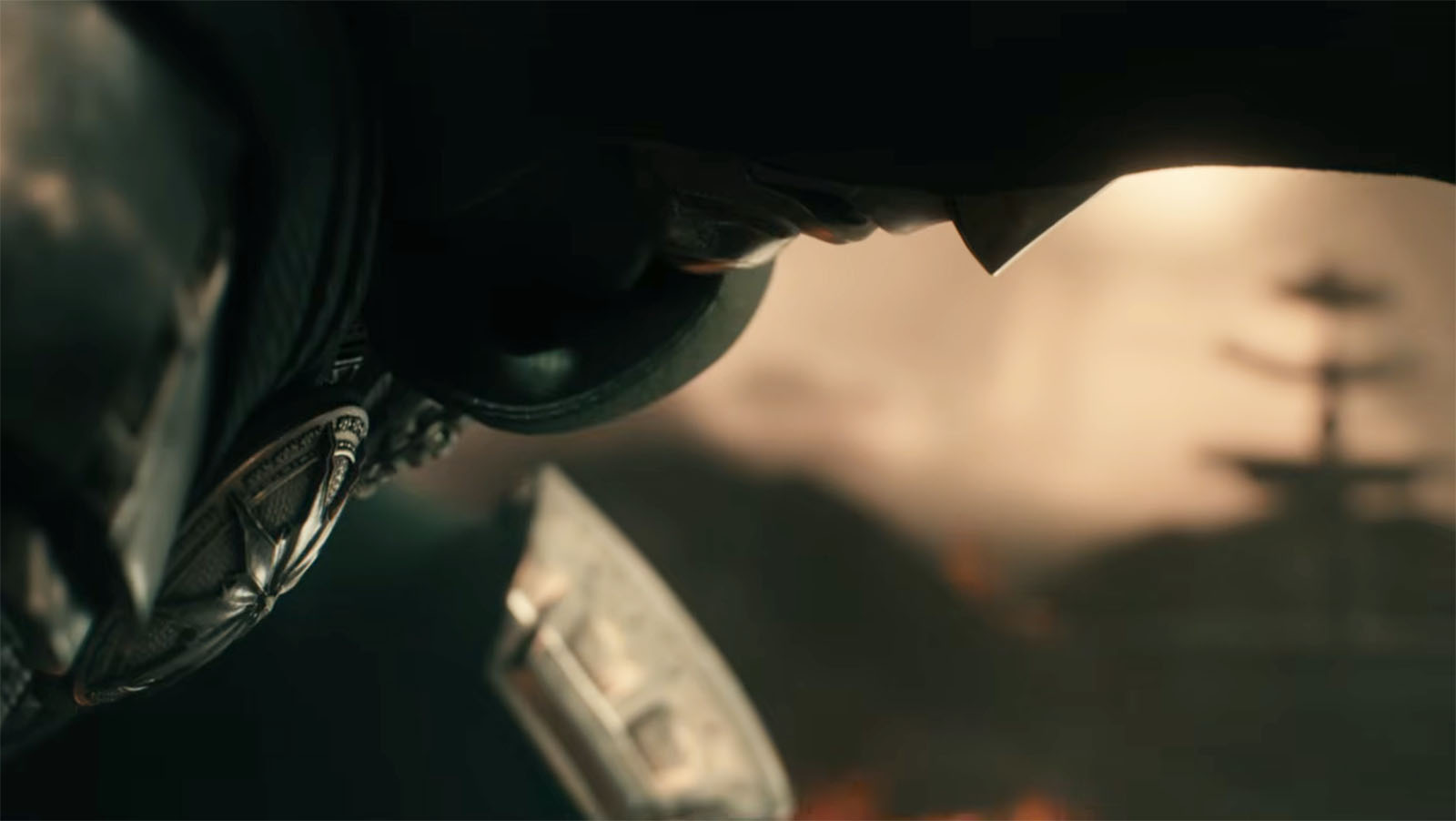 A close up of Doctor Victor von Doom slowly raising his head in Avengers: Doomsday