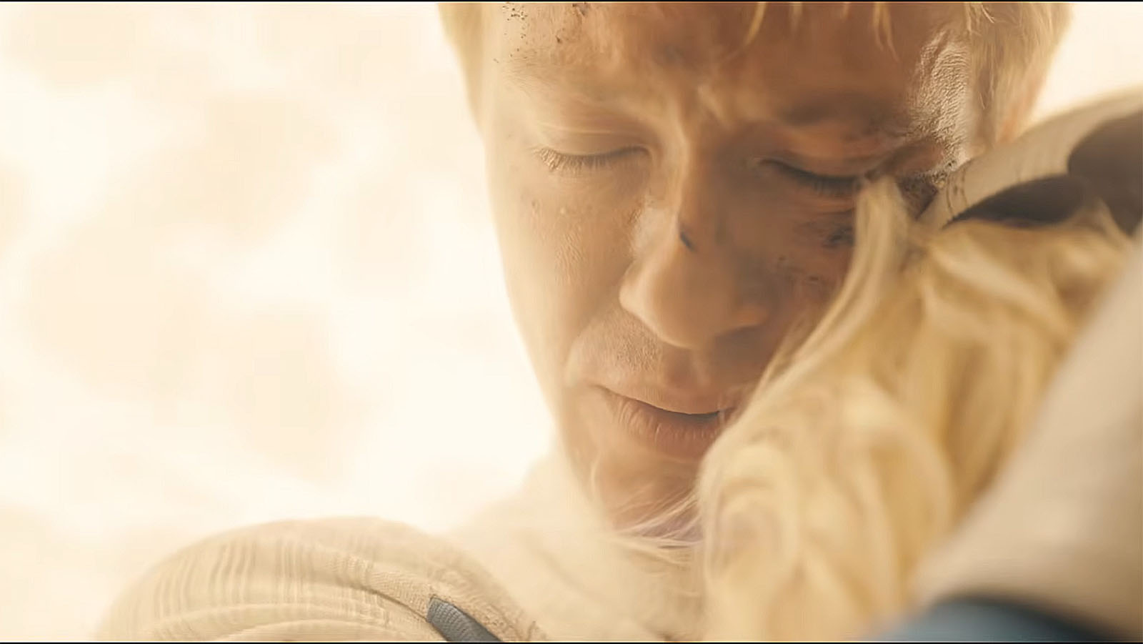 A close up of Johnny Storm hugging his sister Sue in Avengers: Doomsday